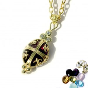 14kt Biltmore Chateau Interchangeable Locket with Blue Topaz, Onyx, and Mother of Pearl $4,999