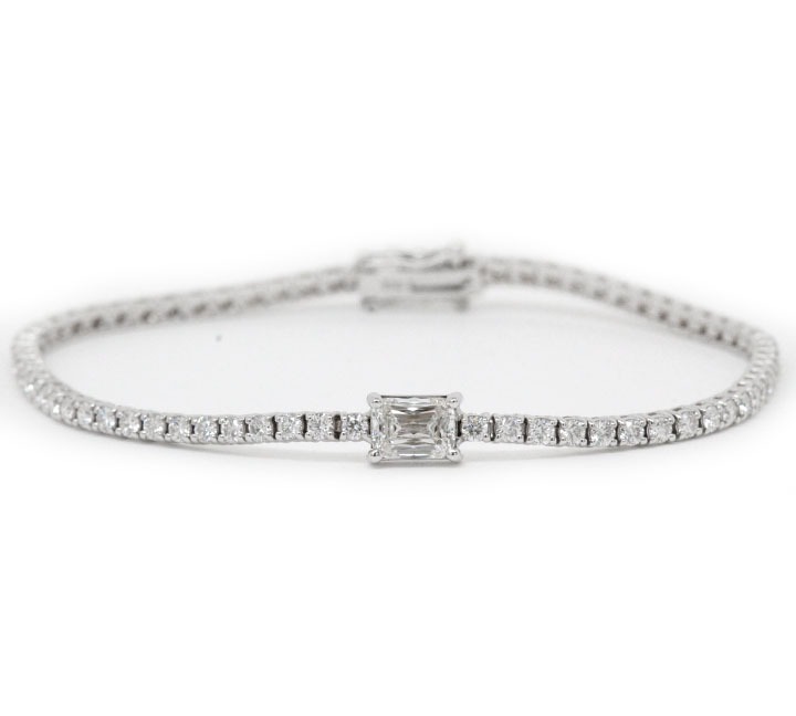Straight Line Diamond Bracelet with Emerald Cut Diamond in the Center
